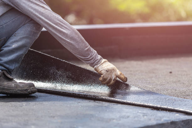 Professional Basement Waterproofing technician working in Highland Park, MI